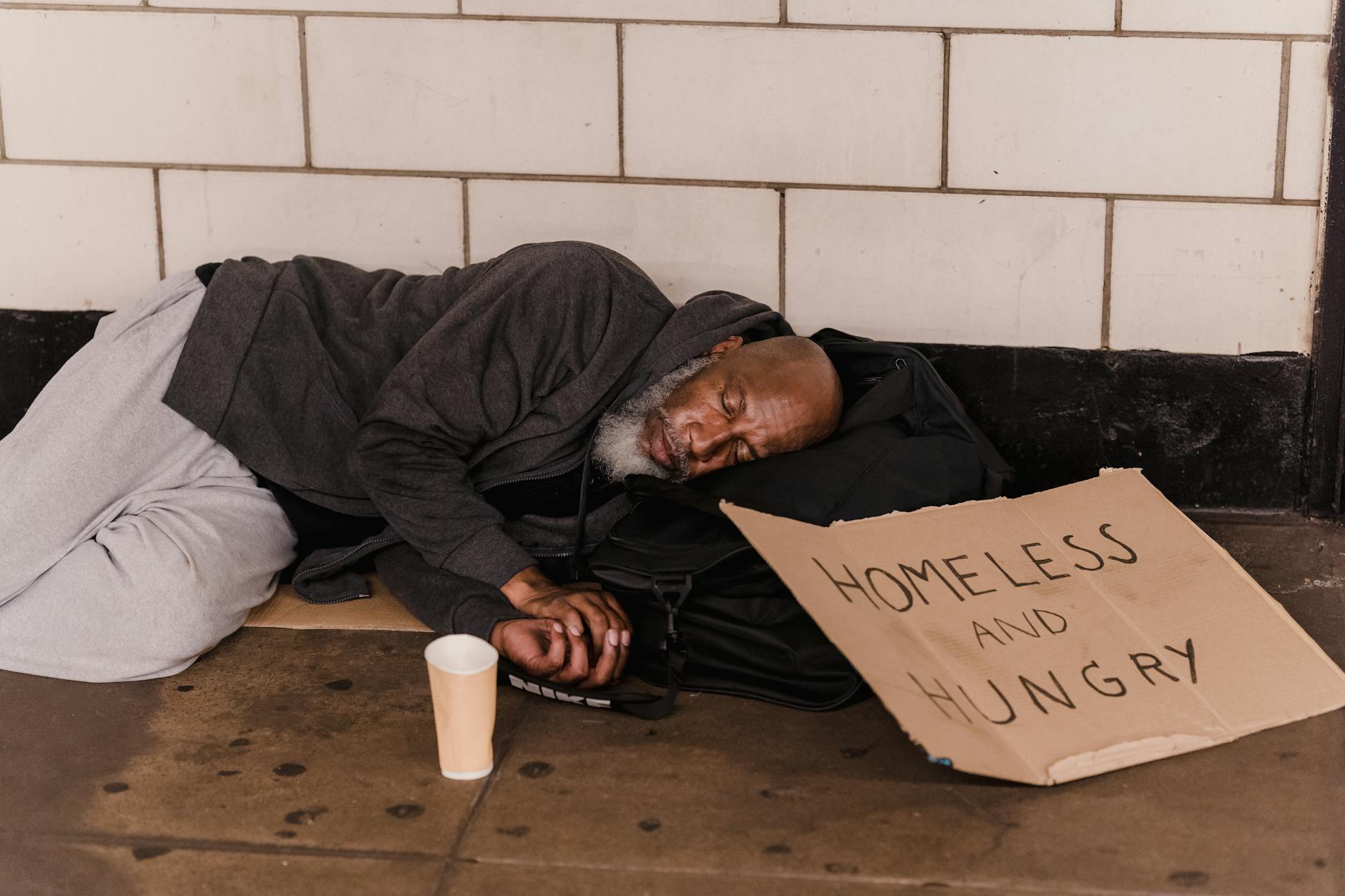 man sleeping on floor